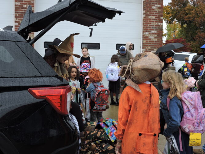 Students Get Surprise Halloween Fun at Bus Stop